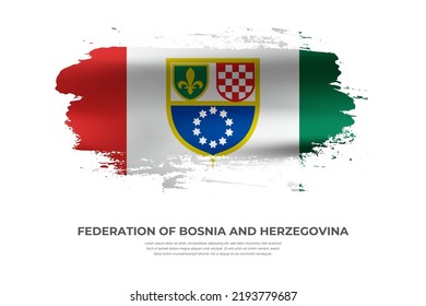 Artistic folded brush flag of Federation of Bosnia and Herzegovina. Paint smears brush stroke flag on isolated white background