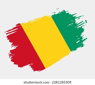 Artistic grunge brush flag of Guinea isolated on white background. Elegant texture of national country flag