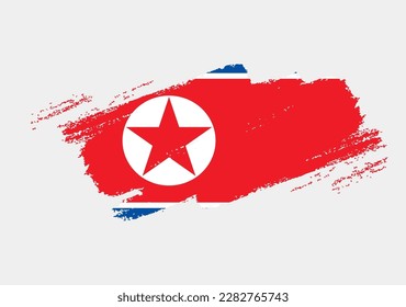 Artistic grunge brush flag of North Korea isolated on white background. Elegant texture of national country flag