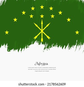 Bandera artística de pincel dibujado a mano de Adygea. Fondo creativo de la bandera nacional.