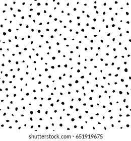 Artistic hand drawn seamless ink pattern. Black and white brush strokes - dots and spots. Repeatable doodle sketch design for print, textile, wrapping paper card background, fashion fabric.
