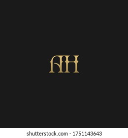 Artistic land luxury black and golden color AH HA A H initial based letter icon logo.