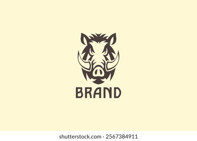 An artistic logo of a boar's head with prominent tusks, designed with a tribal style