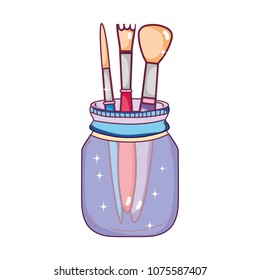 artistic paintbrushes inside crystal bottle object