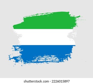 Artistic Sierra Leone national flag design on painted brush concept