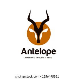 Artistic stylized Impala logotype. Antelope silhouette wild animals. Creative art logo design