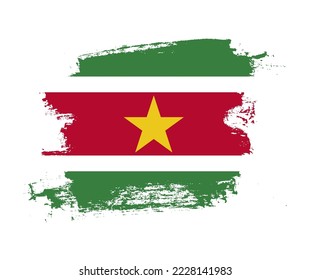Artistic Suriname national flag design on painted brush concept
