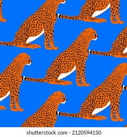 An artistic wild animal background pattern with a repeating cheetah big cat design.
