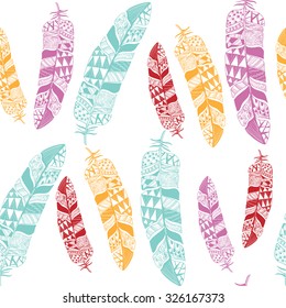 Artistically drawn, stylized, vector set of feathers Â on a white background. Repeating pattern of red, blue, purple and yellow feathers. Can be used for t-shirt, textile, greeting card,sketchbook.