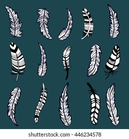 Artistically drawn, stylized, vector set of feathers. Vintage tribal zentangle boho style. Series of doodle pattern feather. Coloring for adults. Hipster tattoo. Mehendi body art element.