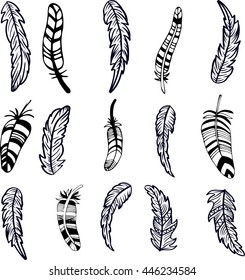 Artistically drawn, stylized, vector set of feathers. Vintage tribal zentangle boho style. Series of doodle pattern feather. Coloring for adults. Hipster tattoo. Mehendi body art element.