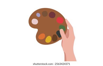 Artists palette with paint colors in hand for painting brush colors in color palette and artist palette with colors to art in canvas by painting brush.