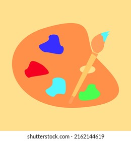 artist's palette with paints on a yellow backgroundartist's palette with paints on a yellow background