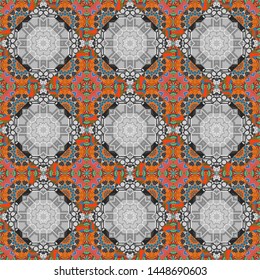 Artwork for creative design, art and entertainment. Seamless pattern in fractal design. It is executed in blue, gray and orange colors. Vector beautiful mandala.