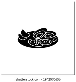  Asari clams glyph icon.Fried in butter clams on plate. Traditional dish.Spring Japanese food concept. Filled flat sign. Isolated silhouette vector illustration