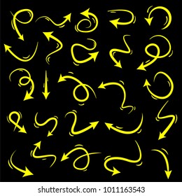 	
asbtract yellow hand drawn arrows set on black background