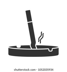 Ashtray with stubbed out cigarette glyph icon. Stop smoking. Silhouette symbol. Negative space. Vector isolated illustration