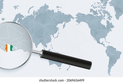 Asia centered world map with magnified glass on Ivory Coast. Focus on map of Ivory Coast on Pacific-centric World Map. Vector illustration.