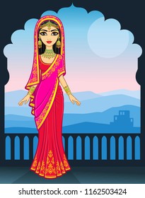 Asian beauty. Animation portrait of the young Indian girl in traditional clothes. Fairy tale princess. Background - the palace, a night mountain landscape. Place for the text. Vector illustration. 
