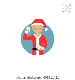 Asian boy holding snowballs