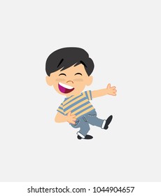 Asian boy in jeans with funny expression.