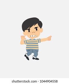 Asian boy in jeans jumps angry.