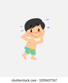 Asian boy in swimsuit pleasantly surprised.																									