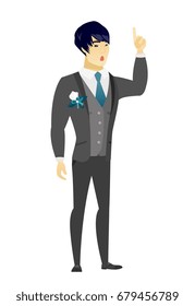 Asian bridegroom with open mouth pointing finger up. Full length of young bridegroom with open mouth came up with successful idea. Vector flat design illustration isolated on white background.