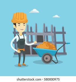 Asian builder with thumb up standing near wheelbarrow full of sand. Young builder in hard hat giving thumb up. Builder at work on construction site. Vector flat design illustration. Square layout.