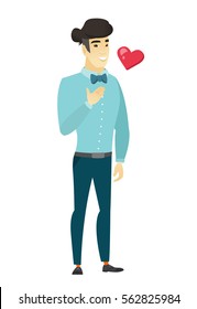 Asian business man holding hand on his chest. Full length of young happy business man with hand on his chest and heart flying nearby. Vector flat design illustration isolated on white background.