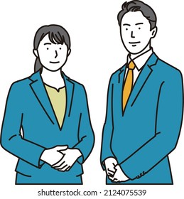 Asian business person standing hand in hand