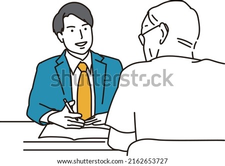Asian businessman explaining to the elderly