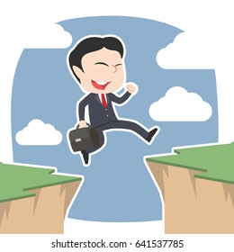 asian businessman jumping over cliff
