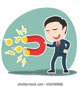 asian businessman using magnet to get coins