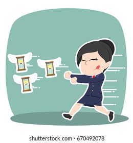 asian businesswoman chasing flying hourglass