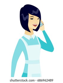 Asiatische sauberer in Uniform sprechen auf einem Handy. Saubere Gespräche auf einem Handy. Junge Reiniger sprechen auf einem Handy. Vektorgrafik mit flachem Design, einzeln auf weißem Hintergrund.