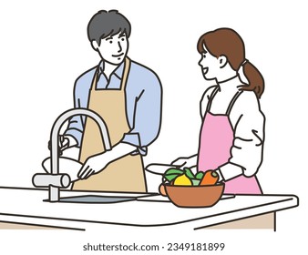 Asian couple cooking in the kitchen