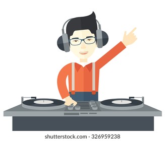 An Asian DJ wearing headphones and glasses with hand up playing vinyl vector flat design illustration isolated on white background. Horizontal layout.