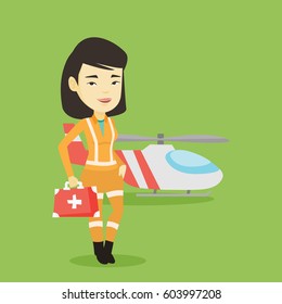 Asian doctor of air ambulance. Young doctor of air ambulance standing in front of rescue helicopter. Doctor of air ambulance holding first aid box. Vector flat design illustration. Square layout.