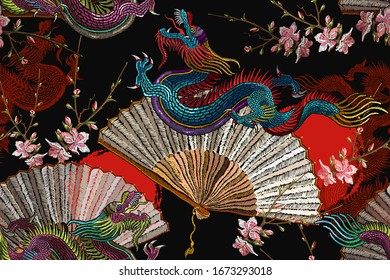 Asian dragons, rising sun, japan fan and sakura flowers. Fashion japanese and chinese style. Template for clothes. Ethnic horizontal seamless pattern. Oriental art 