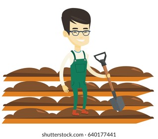 Asian farmer standing with shovel on the background of plowed field. Man working in field with a shovel. Man plowing field with a shovel. Vector flat design illustration isolated on white background.