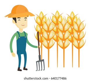 Granjero asiático en sombrero de verano parado con horquilla en el fondo del campo de trigo. Granjero sonriente trabajando con horquilla en campo de trigo. Ilustración de diseño plana vectorial aislada en fondo blanco.