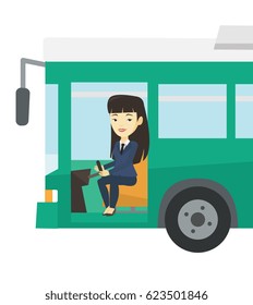 Asian female bus driver sitting at steering wheel. Young driver driving passenger bus. Female bus driver sitting in drivers seat in cab. Vector flat design illustration isolated on white background.