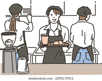 Asian female clerk working at a cafe (restaurant)
