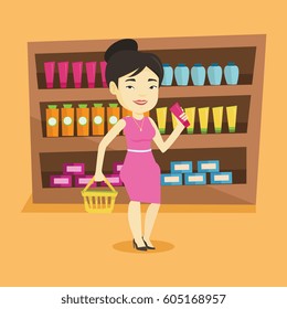 Asian female customer shopping at supermarket with basket. Young customer holding a shopping basket in one hand and a tube of cream in another. Vector flat design illustration. Square layout.