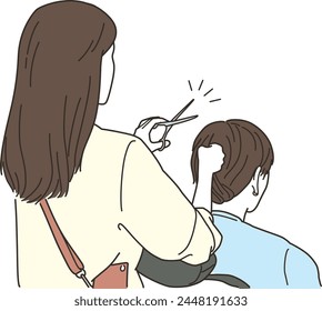 Asian female hairdresser cutting the hair of a male customer