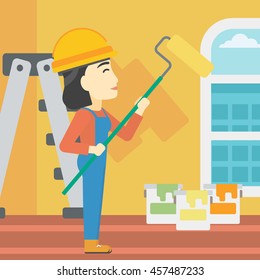 An asian female painter in overalls with a paint roller in hands. Painter painting walls with a paint roller in an apartment. Vector flat design illustration. Square layout.