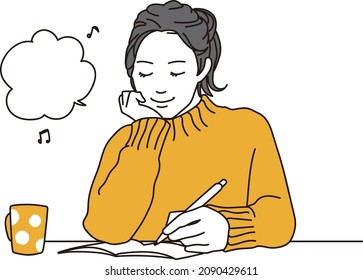 Asian female taking notes in a notebook