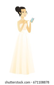 Asian fiancee holding a mobile phone and pointing at it. Full length of young fiancee with a mobile phone. Fiancee using a mobile phone. Vector flat design illustration isolated on white background