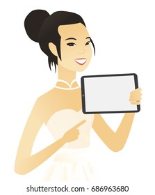 Asian fiancee holding a tablet computer. Young fiancee pointing at the tablet computer. Fiancee with a tablet computer. Vector flat design illustration isolated on white background.